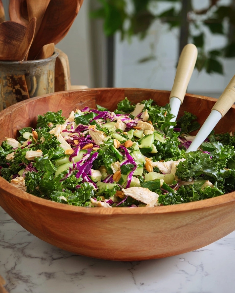 A wooden bowl filled with a fresh salad showing three main layers: at the bottom, bright green kale leaves with ruffled edges; in the middle, thin strips of purple cabbage adding a contrast of deep violet; and scattered on top, light beige pieces of cooked chicken along with whole cashew nuts. The salad is sprinkled evenly with small white sesame seeds, adding texture and a hint of color. The bowl sits on a white marbled surface, and natural light highlights the vibrant colors and textures of the salad photo taken with an iphone --ar 4:5 --v 7