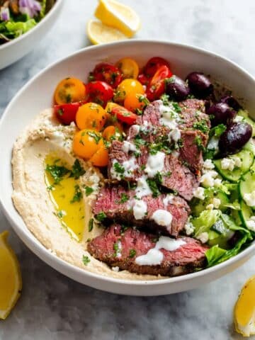 Mediterranean Steak Bowls with Grilled Vegetables, Hummus, and Herbed-Yogurt Dressing Recipe