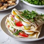 Eggplant and Potato Pita Sandwich with Pickles, Eggs, and Hummus Recipe