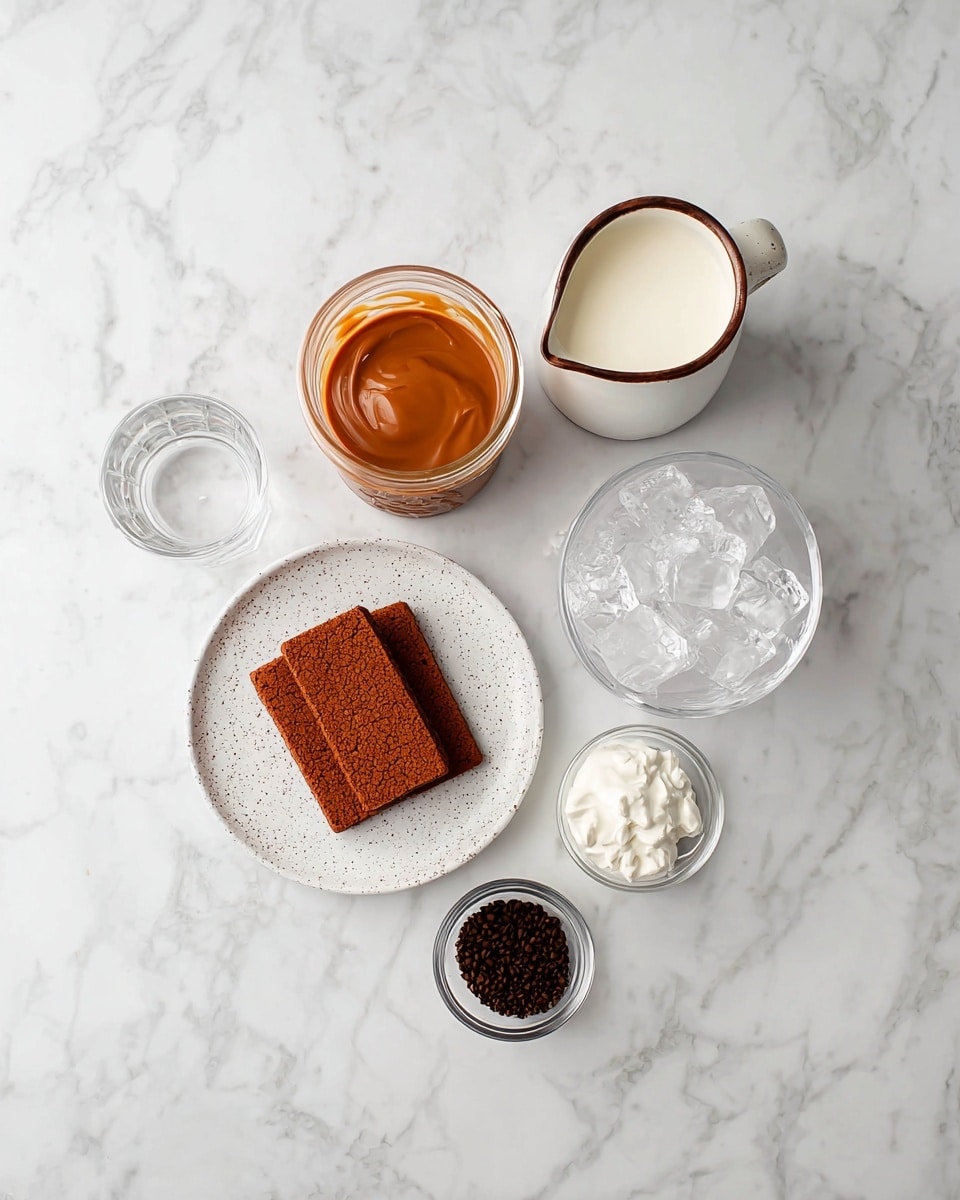 A top-down view of several ingredients placed separately on a white marbled surface, including a small white speckled plate with three brown rectangular cookies stacked in it at the bottom left, a glass jar filled with smooth caramel-colored sauce above the plate, a small clear glass of water to the right of the jar, a small white pitcher with a brown handle filled with cream below the glass of water, a clear glass bowl filled with ice cubes to the right of the pitcher, a clear glass bowl with finely ground coffee below the glass of water, and a white pitcher filled with milk at the bottom left corner photo taken with an iphone --ar 4:5 --v 7
