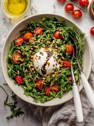 Arugula Burrata Salad with Cherry Tomatoes and Toasted Pine Nuts Recipe