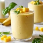 Creamy Mango Banana Smoothie with Lime and Fresh Herbs Recipe