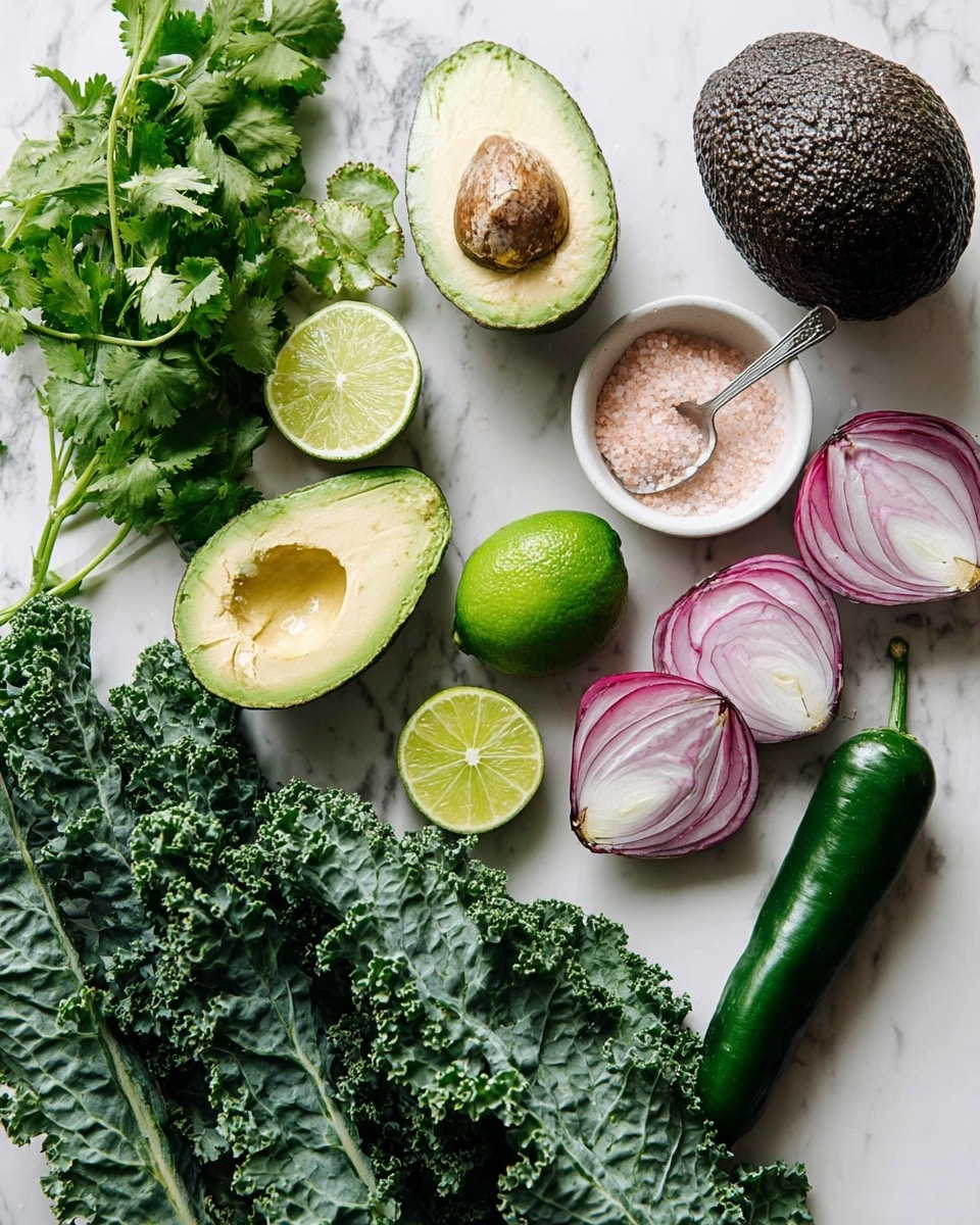 The image shows fresh ingredients arranged on a white marbled surface. There are three avocado halves, one with a seed, showing a smooth light green inside with a rough dark brown outside. Four bright green lime halves with a juicy texture are placed near the center. Two large curly kale leaves with dark green, rough textures are at the bottom left. Next to the kale, there is a bunch of fresh cilantro with delicate light green leaves. Two halves of a red onion show white and purple layers with a shiny surface, placed on the right side. A whole avocado with dark bumpy skin sits near the top middle. Near the top right is a small white bowl filled with pink salt and a small spoon inside. A long, smooth, dark green chili pepper lies next to the bowl. The ingredients are naturally spread out with good lighting that highlights their colors and textures. Photo taken with an iphone --ar 4:5 --v 7