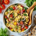 Tortellini Pasta Salad with Cherry Tomatoes, Artichokes, and Fresh Herbs Recipe