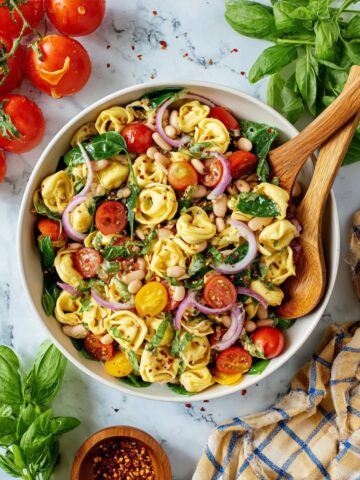 Tortellini Pasta Salad with Cherry Tomatoes, Artichokes, and Fresh Herbs Recipe