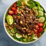 Sesame Ginger Steak Salad with Grape Tomatoes, Crispy Fried Onions & Peanuts Recipe