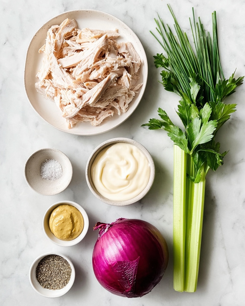 The image shows several ingredients arranged neatly on a white marbled surface. In the top left, there is a white plate filled with sliced cooked chicken, light beige with slightly browned edges. To the right of the chicken, there is a small white bowl with smooth, creamy white mayonnaise. Below the chicken, there is a whole red onion with deep purple and shiny skin. Next to the onion, a fresh light green celery stalk is placed vertically. To the right of the celery, there are thin long chives, bright green and fresh-looking. At the bottom right corner, a bunch of green parsley with leafy texture is visible. To the left of the celery and parsley, a small white dish contains a mustard-like yellow paste. Above that, a small bowl holds coarse salt and ground black pepper. The background is a clean white marbled surface, and the overall setup is bright with natural light. Photo taken with an iphone --ar 4:5 --v 7