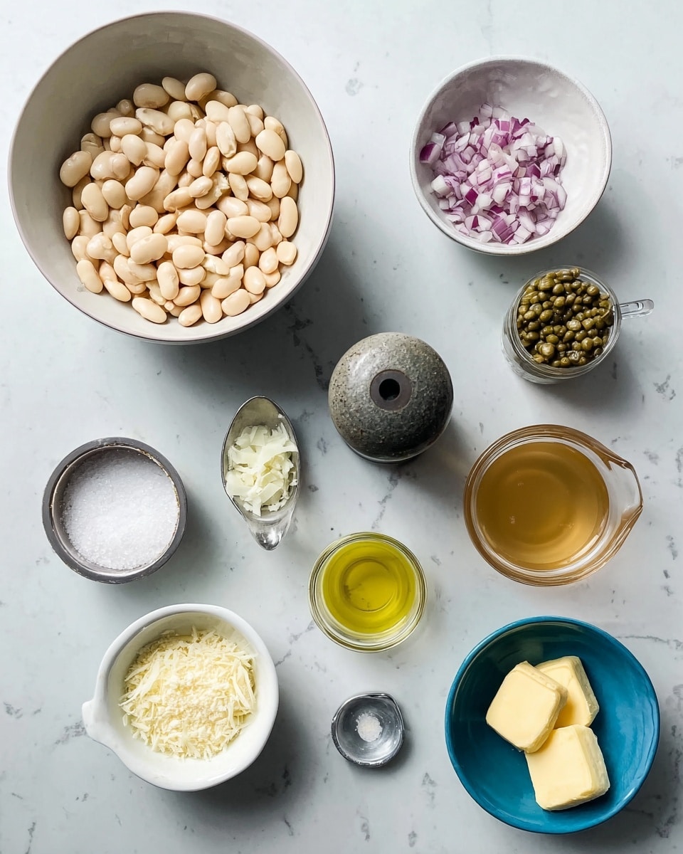 The image shows a collection of ingredients neatly arranged on a white marbled surface, each in its own bowl or container. On the top left is a large white bowl filled with light beige beans, showing a smooth texture. Next to it on the right are two smaller white bowls, one containing chopped white garlic and the other finely chopped purple and white onions. A jar of greenish capers is placed to the far right. In the center is a dark round pepper grinder and a small metal cup filled with salt. Below these, a small white bowl holds white grated cheese, beside it is a small clear measuring cup with light yellow liquid, and next to that is a small white bowl with a yellow powdery substance. On the bottom right, a small blue bowl contains two pats of yellow butter and to its right is a large clear measuring cup filled with a light brown liquid. Photo taken with an iphone --ar 4:5 --v 7