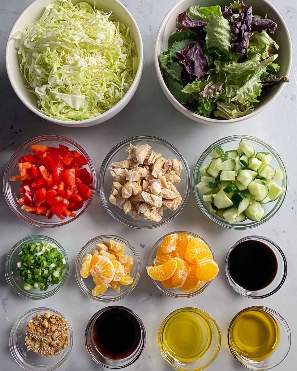 This image shows a neat arrangement of salad ingredients on a white marbled surface. At the top, there are two white bowls: the left one filled with shredded pale green cabbage, and the right one holding a mix of dark green and purple leafy greens. Below these, three clear glass bowls sit side by side, from left to right containing red bell pepper pieces, chopped cucumber with light and dark green skin, and small chunks of cooked light brown chicken. Beneath them are four small bowls in a row — finely chopped light green scallions on the left, a pale yellow salad dressing in the center, bright orange mandarin segments to the right, and small piles of minced ginger and a brown powder seasoning in the far left bowl. At the bottom row are three more small clear bowls filled with dark brown soy sauce, light tan cashew nuts, and golden yellow olive oil. photo taken with an iphone --ar 4:5 --v 7