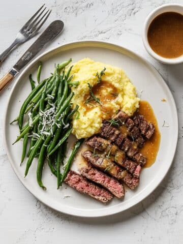 Rib-Eye Steak Over Truffled Mashed Potatoes with Green Beans Amandine Recipe